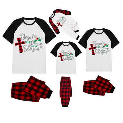 Jesus is the Reason Family Christmas Pajamas Set - White Top, Red Plaid Pants, Black Sleeves, Red Plaid Cross and Holly Print