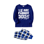 We Are Family 2026 Christmas Pajamas Set - Navy Top Blue and White Plaid Pants White Text Graphic