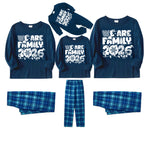 We Are Family 2026 Christmas Pajamas Set - Navy Top Blue Plaid Pants White Text Graphic