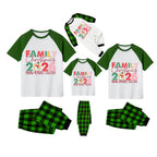 White Top Green Sleeves Green Plaid Pants Pajamas Set With Colorful Christmas Slogan Print