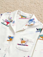 Playful Pups in Sweaters Skiing Neutral Women Christmas PJs