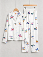 Playful Pups in Sweaters Skiing Neutral Women Christmas PJs