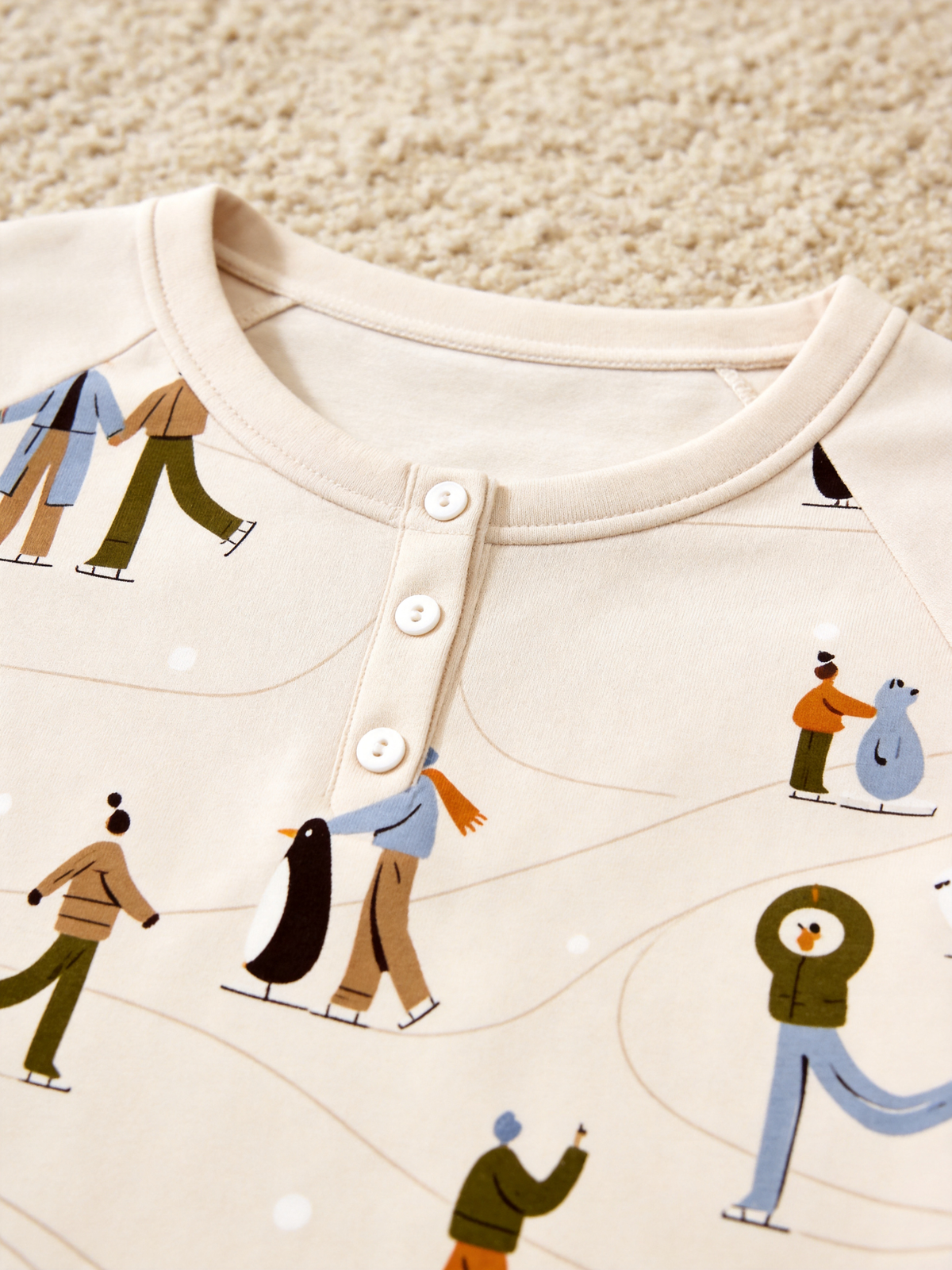 Cozy Winter Ice Skating & Penguins Two-Piece Henley Neck Matching Family Christmas Pajamas