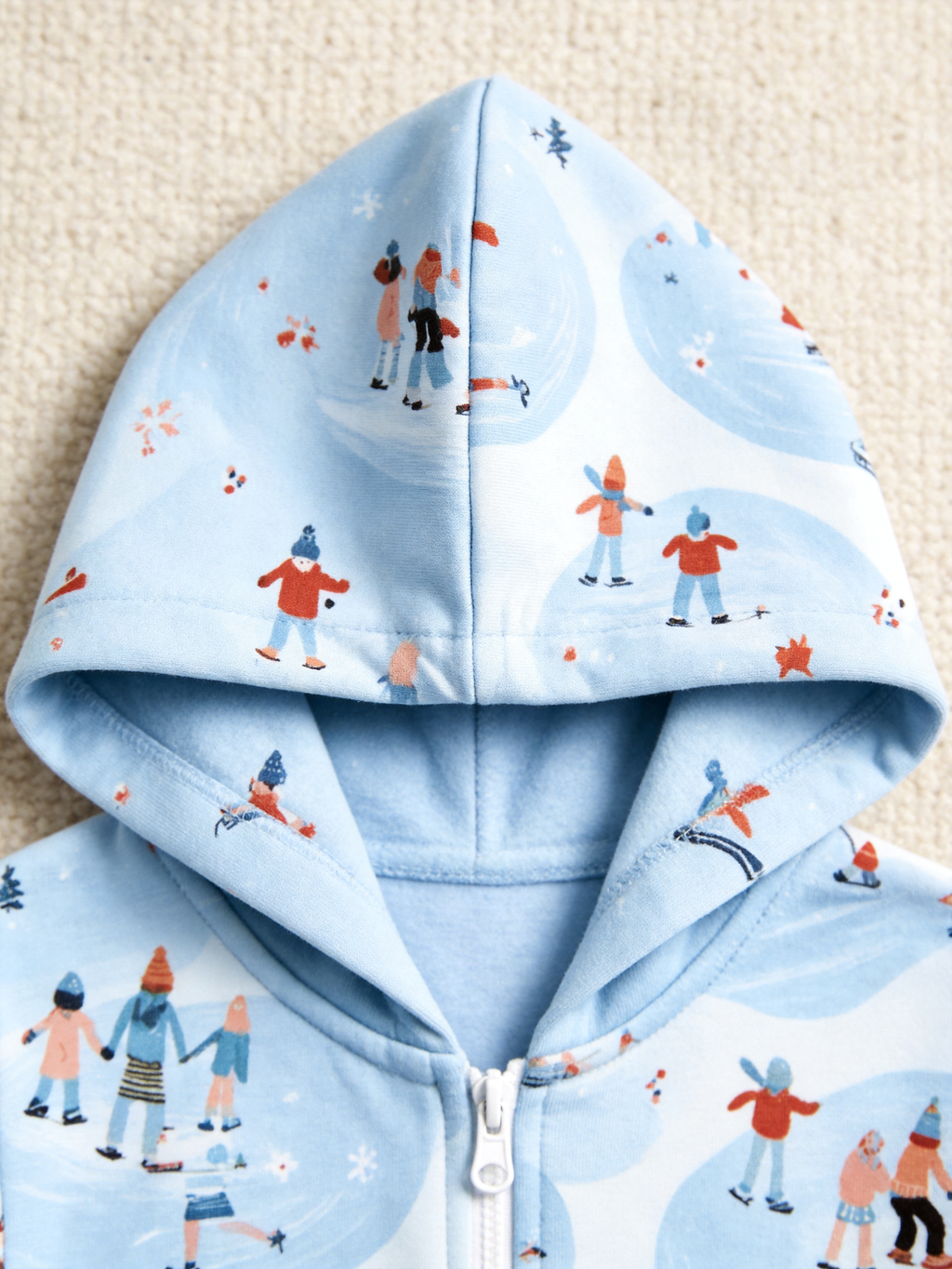 Ice-Skating People & Sled Blue Christmas Women Hooded Onesie - Zip-Up Loungewear