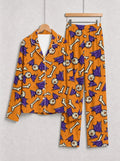 Orange Spooky Eyeball, Bone, and Bat Wing Print Pajama Set